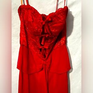This is a perfect elegant, yet sexy red dress with lace in the front!!!